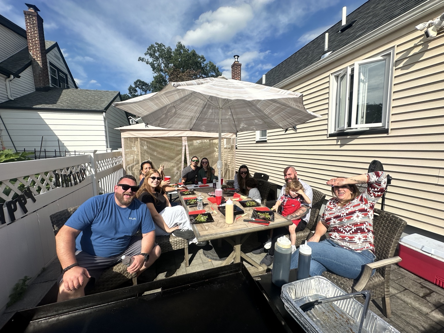 Guests enjoying an at-home hibachi party